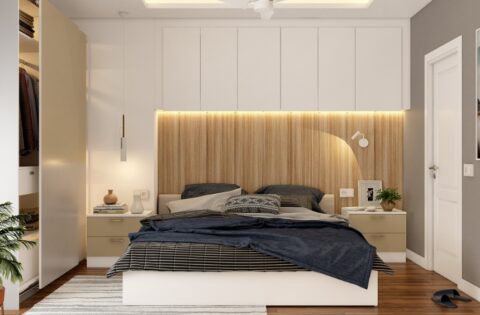 Modern 2BHK bedroom interior design cost in Hyderabad featuring a double bed, overhead cabinets, sliding wardrobe and wooden flooring