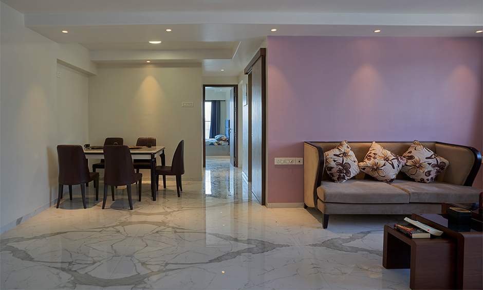 Classic white walls paired with lavender create a timeless drawing room colour idea for any space.