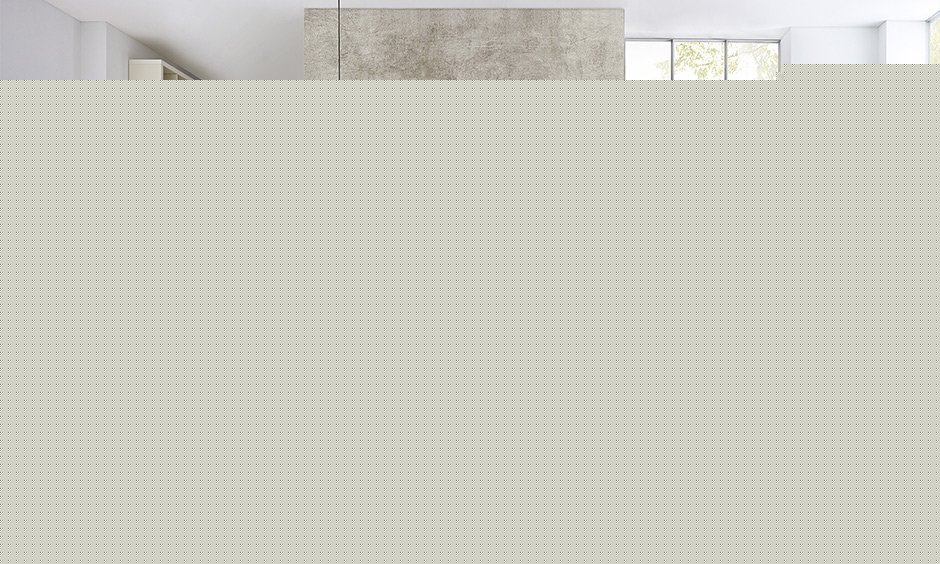 Drawing room wall decoration in a minimal way with the chic hanging lamp and light colours wall adds a softer touch.