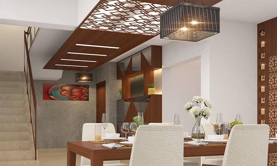 Dining room ceiling design made using timber and glass combination in an intricate pattern with hanging light looks rustic.