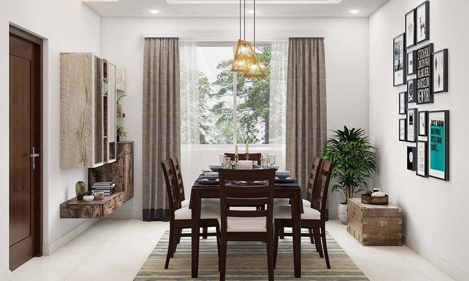 Simple dining room decor with pendant lights above the table for some extra charm and sparkle