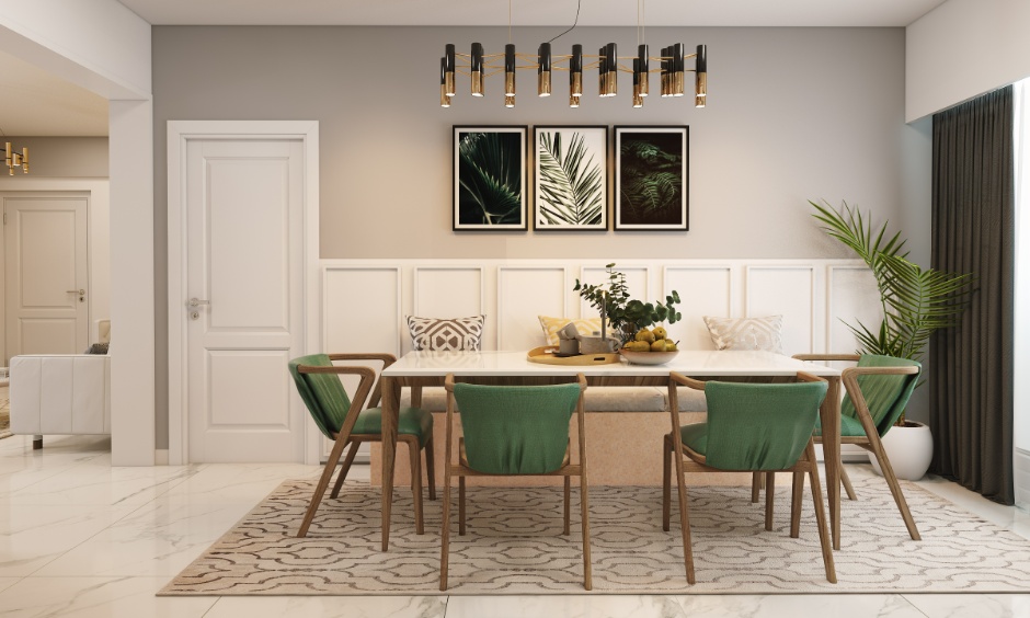 Dining room trends 2026 with contemporary table, muted tones and hardwood flooring.