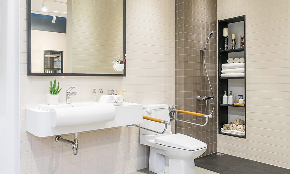 Elderly friendly bathroom designs with a hand shower for old aged people