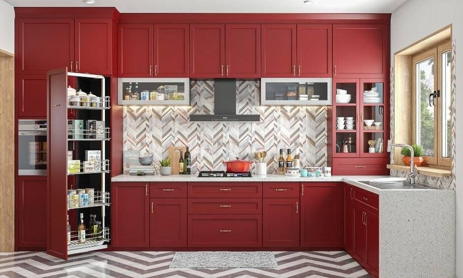 Home 3bhk designed with an l-shaped kitchen in a red matte colour scheme