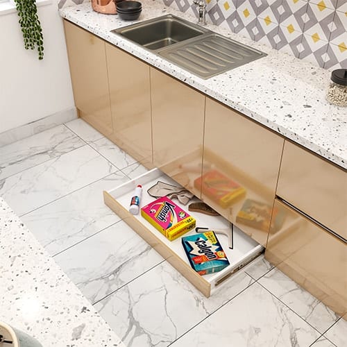 Home interior designer in Gandhinagar created a skirting drawer that utilizes the dead space