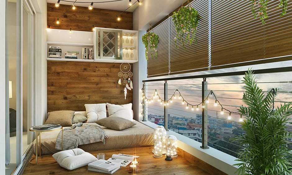 New year party decorations for balcony with floor cushions and fairy lights