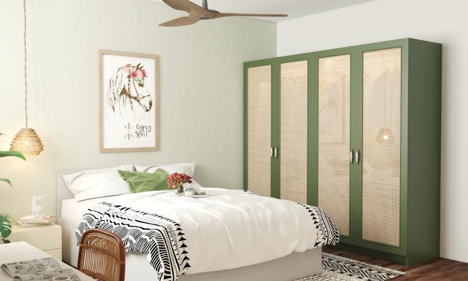 Sage green furniture in living room with earthy tones, vintage details and a warm, timeless look