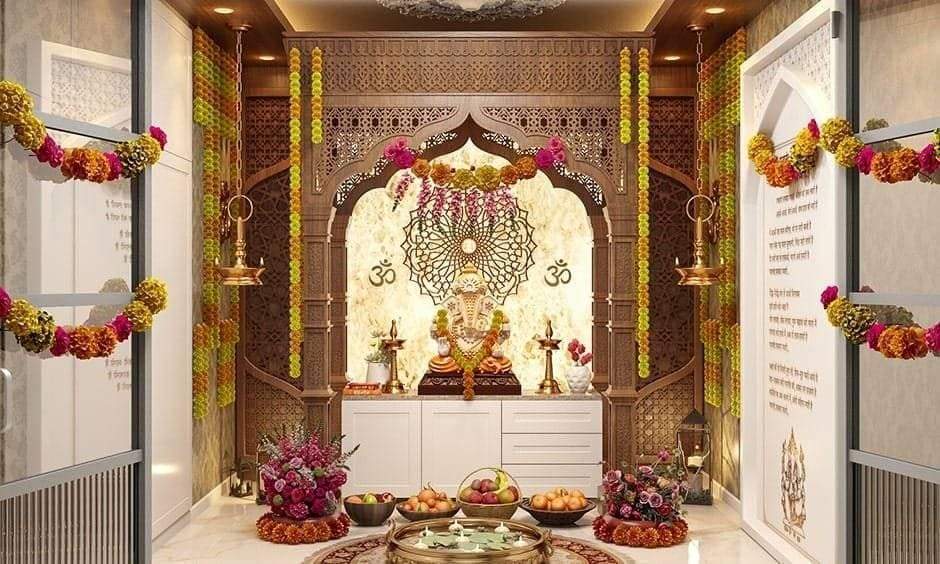 Ganesh Chaturthi decoration featuring spotlights, fairy lights, and lanterns creating a vibrant atmosphere