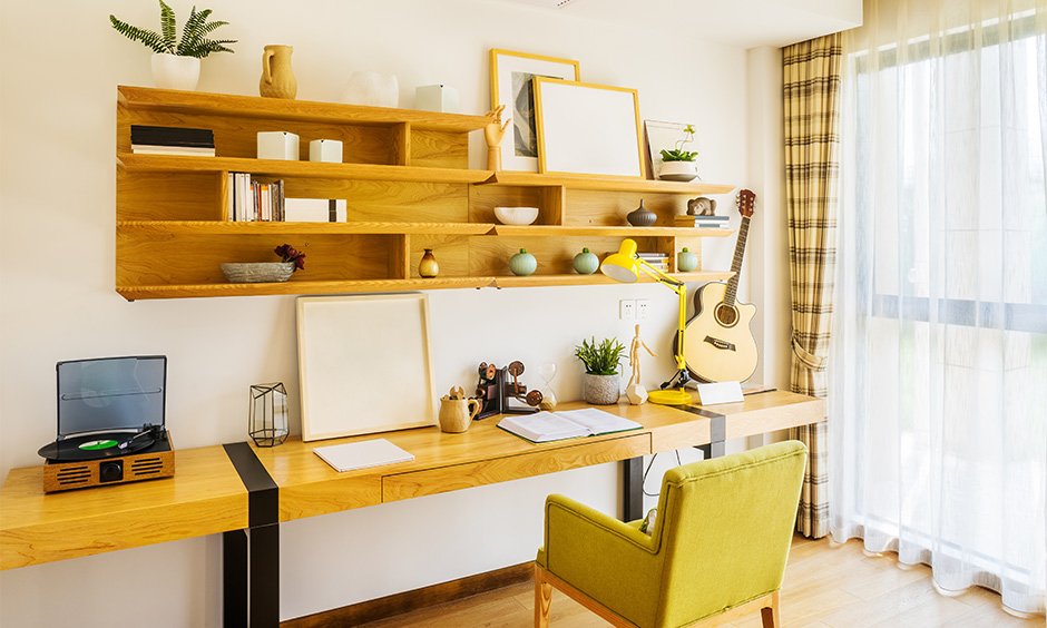 Study room wall decorating idea, Wall-mounted open shelves act as storage and lend a chic look to space.