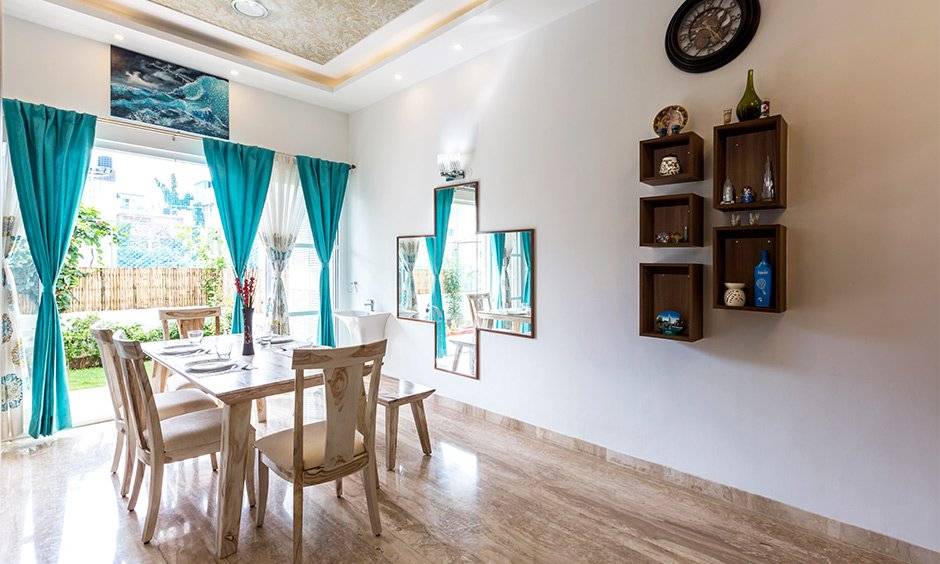Rustic tone wooden farmhouse dining with four splat-back chairs